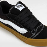 Buy Vans Knu Skool Chunky Skate Shoes in Black/Gum at Tuesdays Skateshop Bolton. Suede Upper construct. Puffy 3D sidestripe. Reissued 90's low profile, nostalgia. Red tab detail at heel. Chunky Laces. Waffle Sole. VN0009QCB9M1. Fast Free delivery options, Buy now pay later with Klarna/Clearpay & multiple secure checkout options. See our trustpilot reviews and shop with confidence.