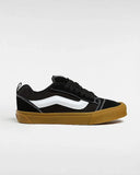 Buy Vans Knu Skool Chunky Skate Shoes in Black/Gum at Tuesdays Skateshop Bolton. Suede Upper construct. Puffy 3D sidestripe. Reissued 90's low profile, nostalgia. Red tab detail at heel. Chunky Laces. Waffle Sole. VN0009QCB9M1. Fast Free delivery options, Buy now pay later with Klarna/Clearpay & multiple secure checkout options. See our trustpilot reviews and shop with confidence.